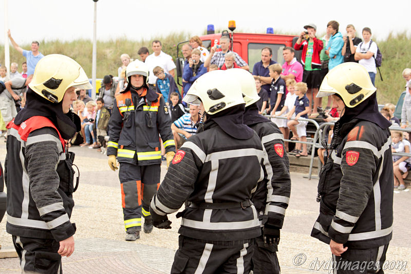 Firefighters discuss.