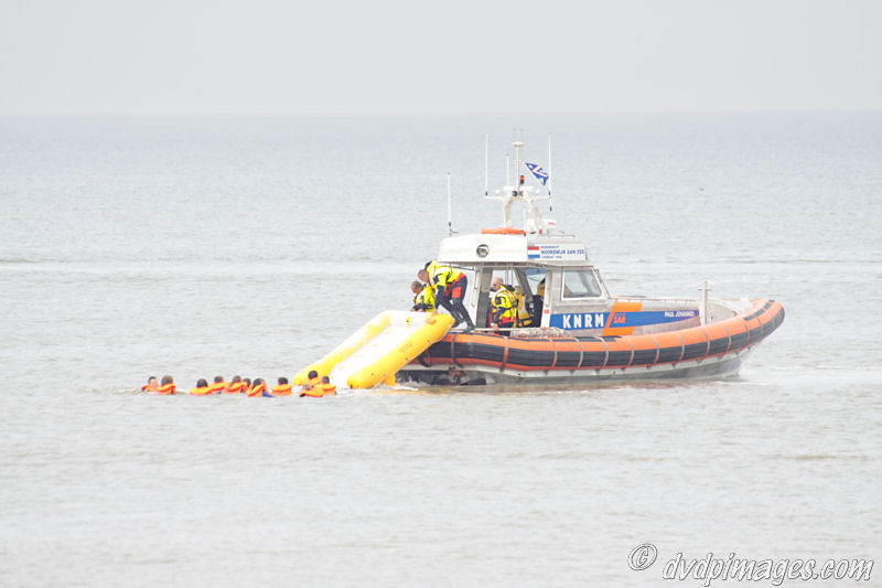 Rescue by using an inflatable ramp. This is useful for taking in many people fast.